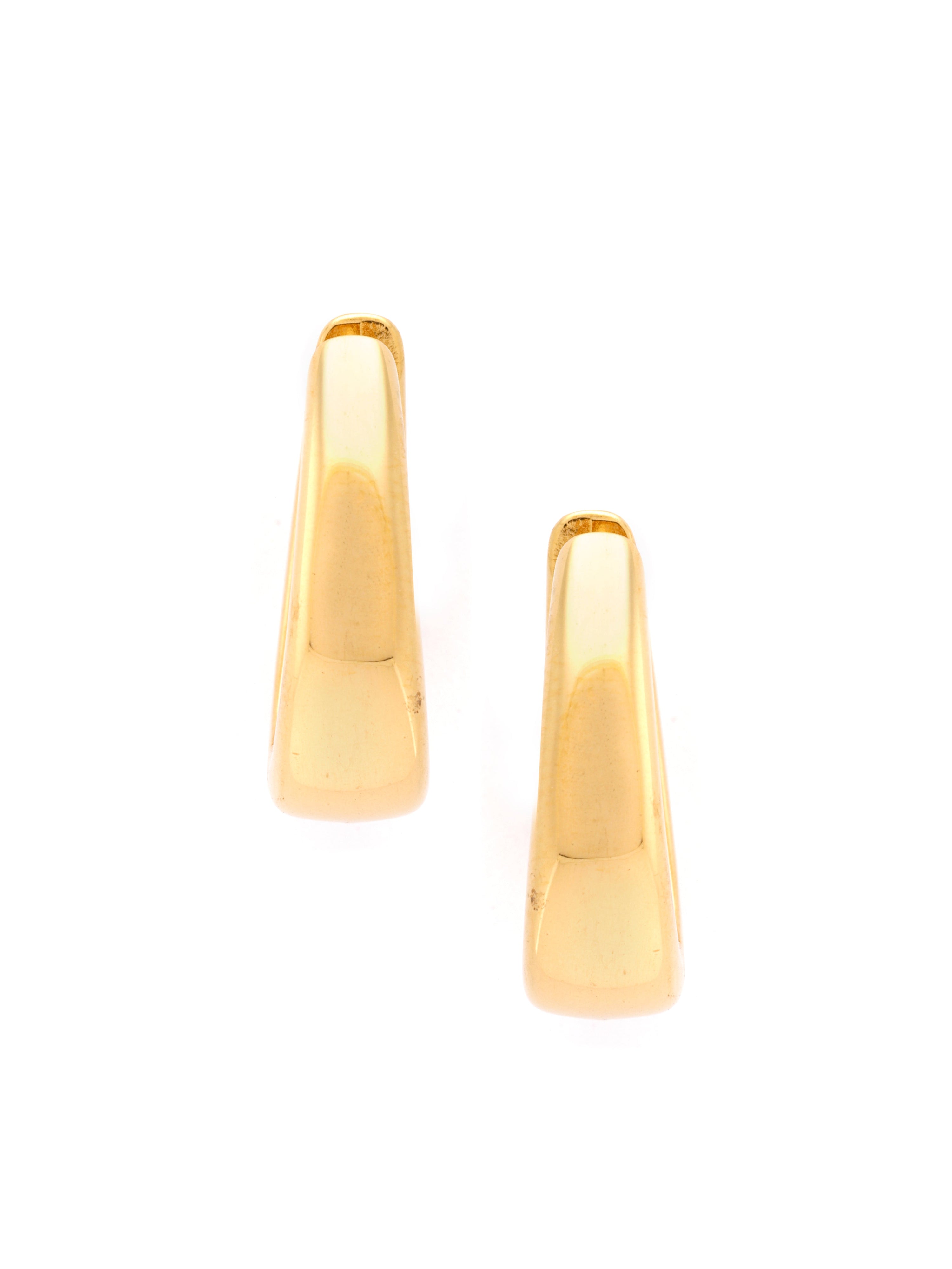 Gold earrings on a white background