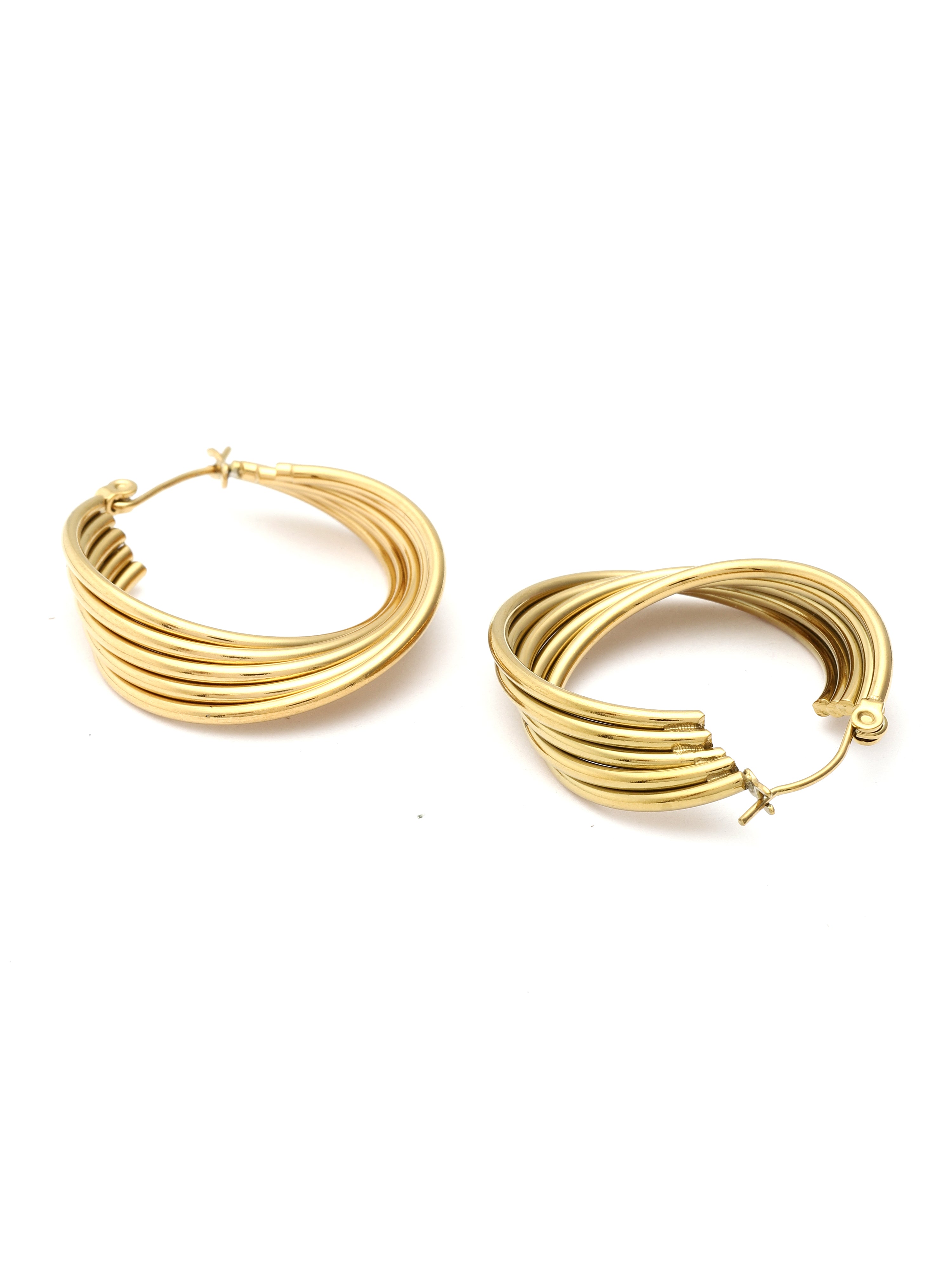 Gold hoop earrings on a white background