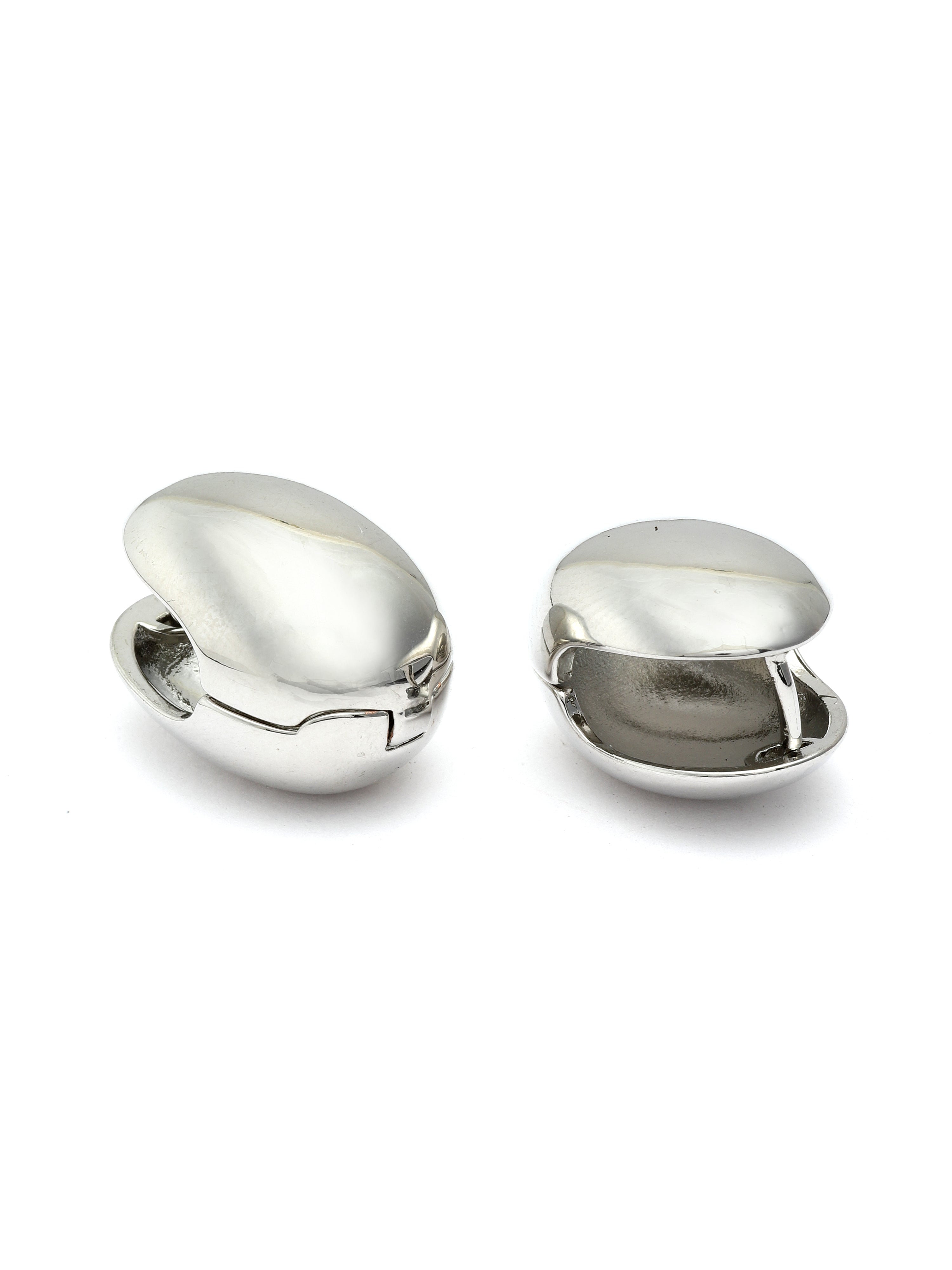 Pair of silver cufflinks on a white background