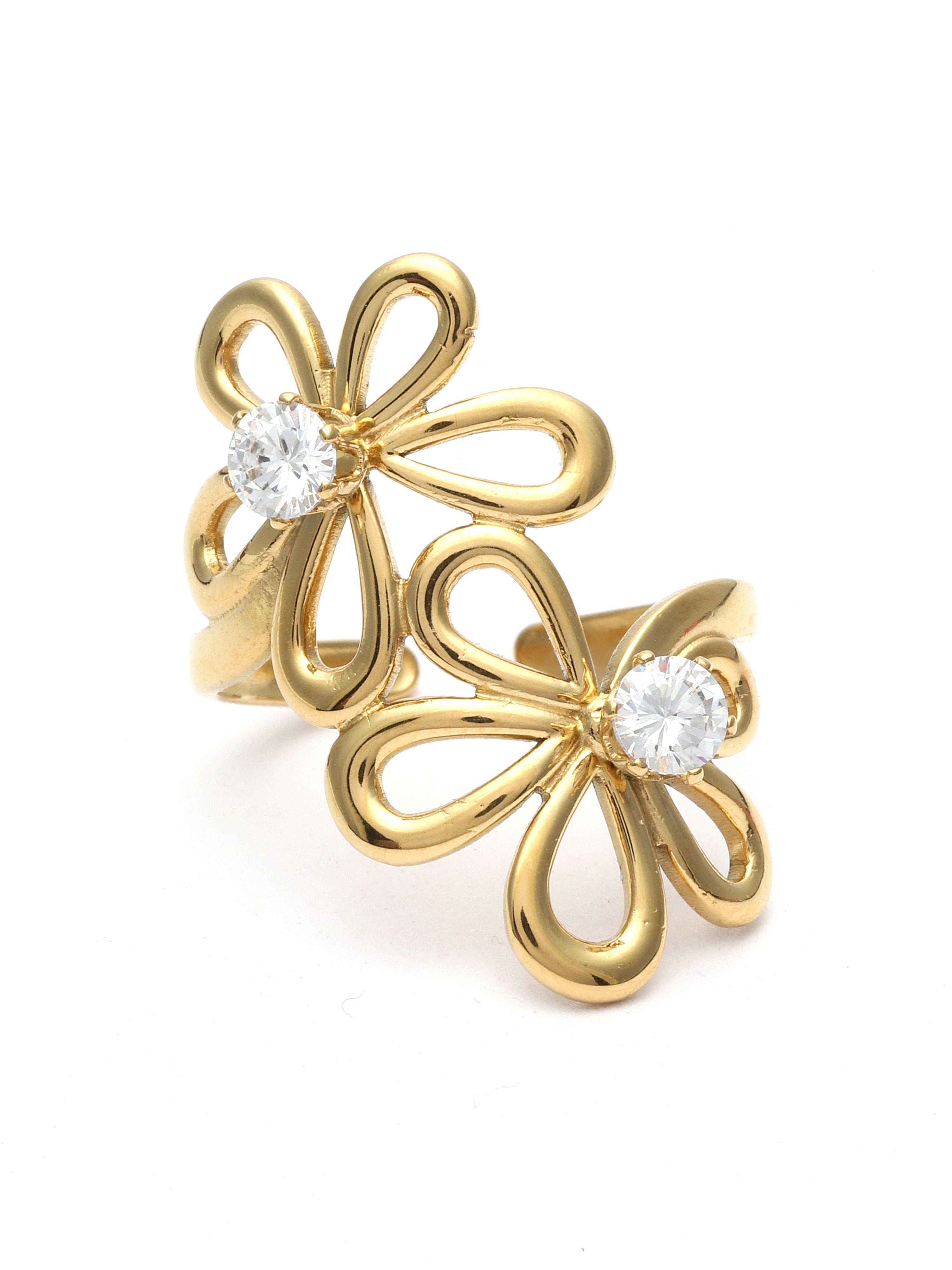 Gold flower-shaped earrings with clear gemstones on a white background