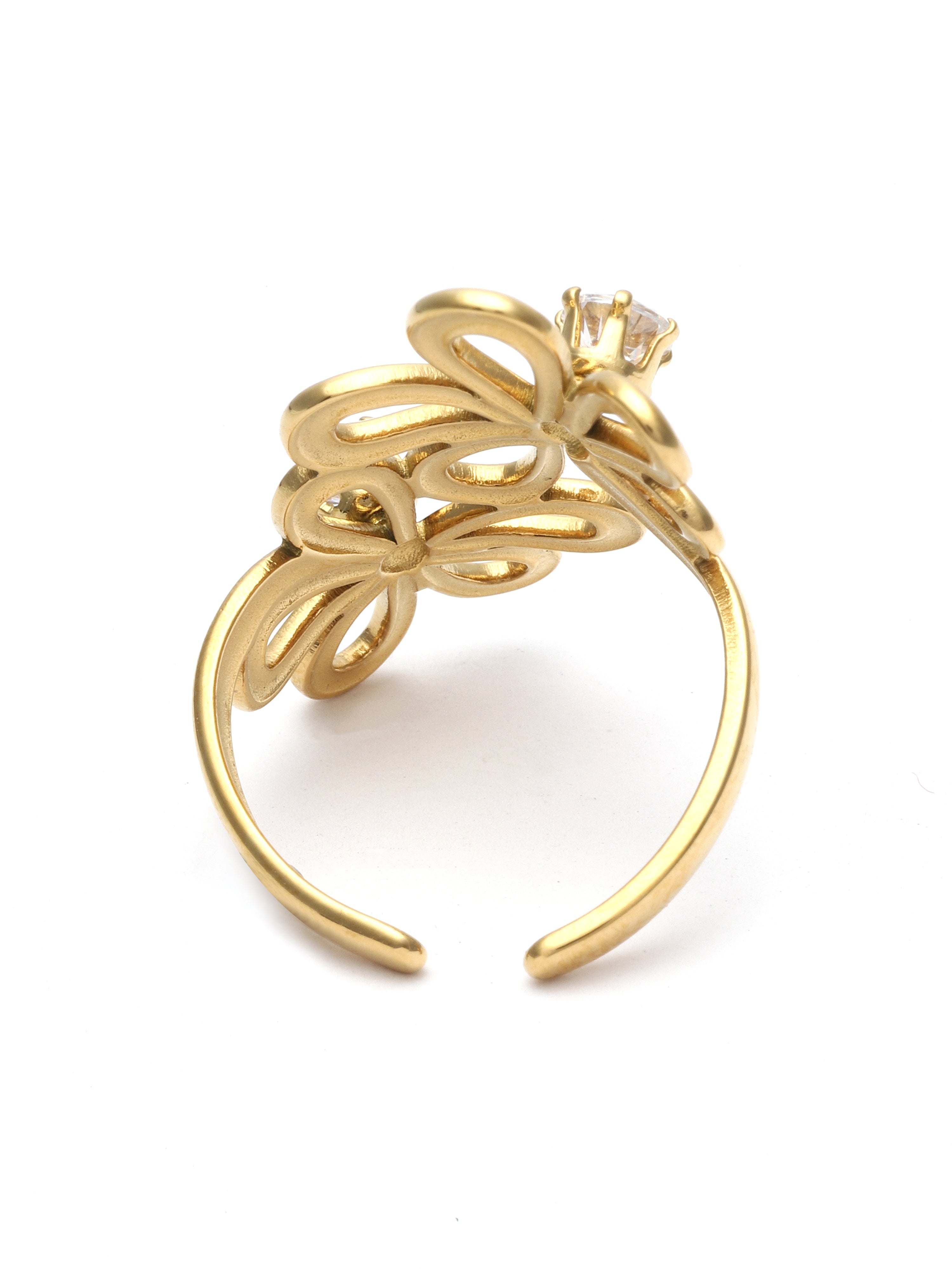 Gold ring with floral design and diamond on a white background