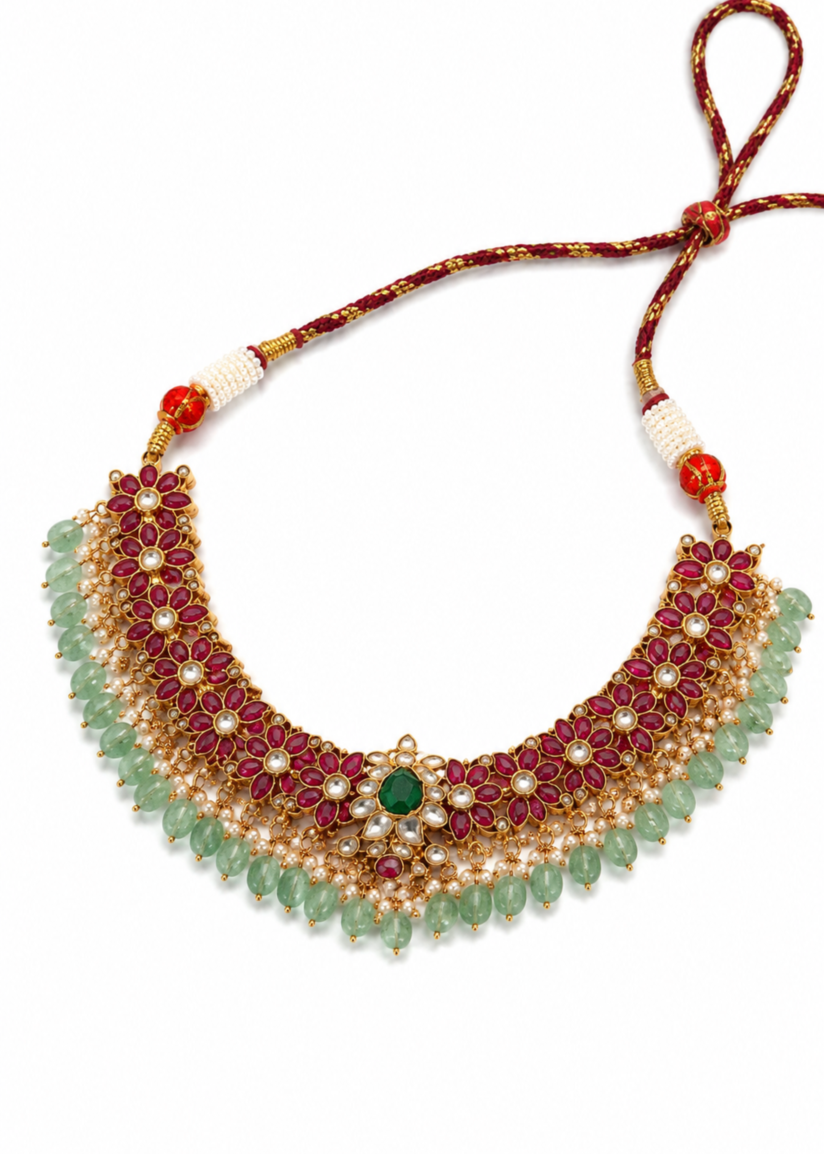 Ornate necklace with beads and gemstones on a white background