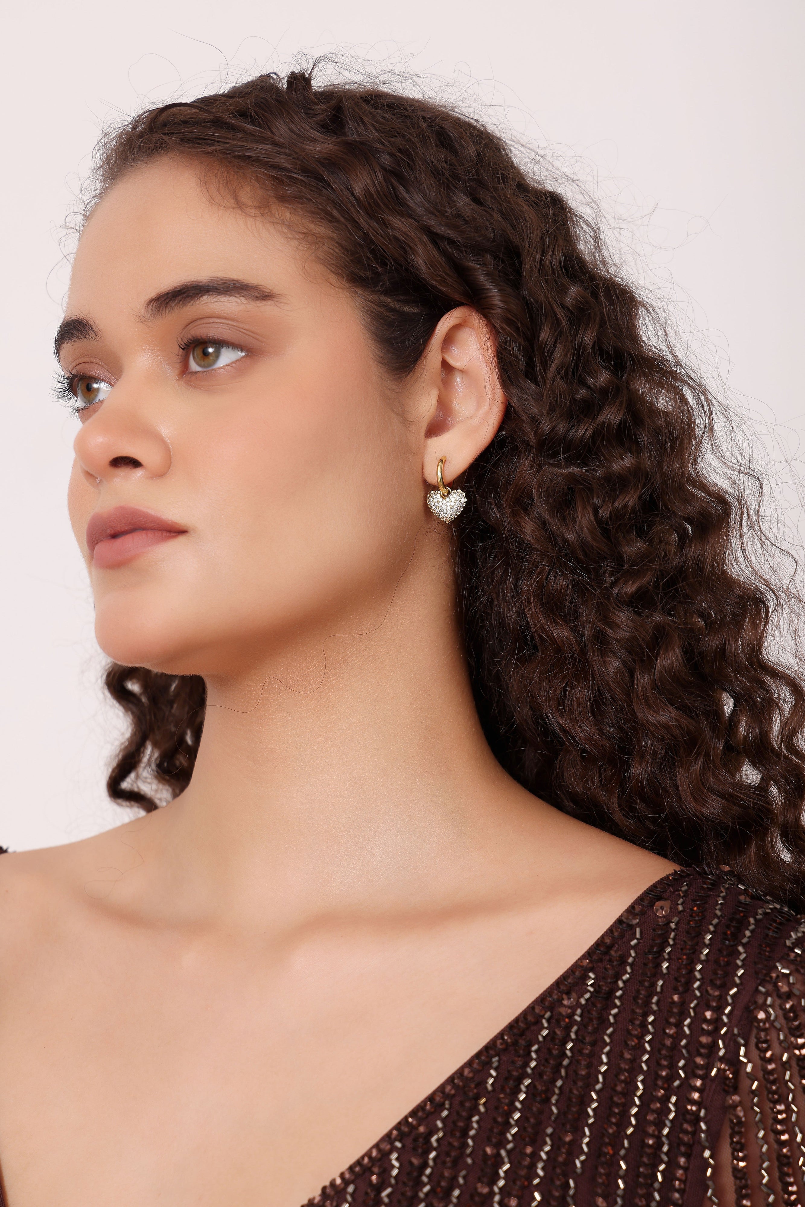 Model wearing Darling Hoops β side profile