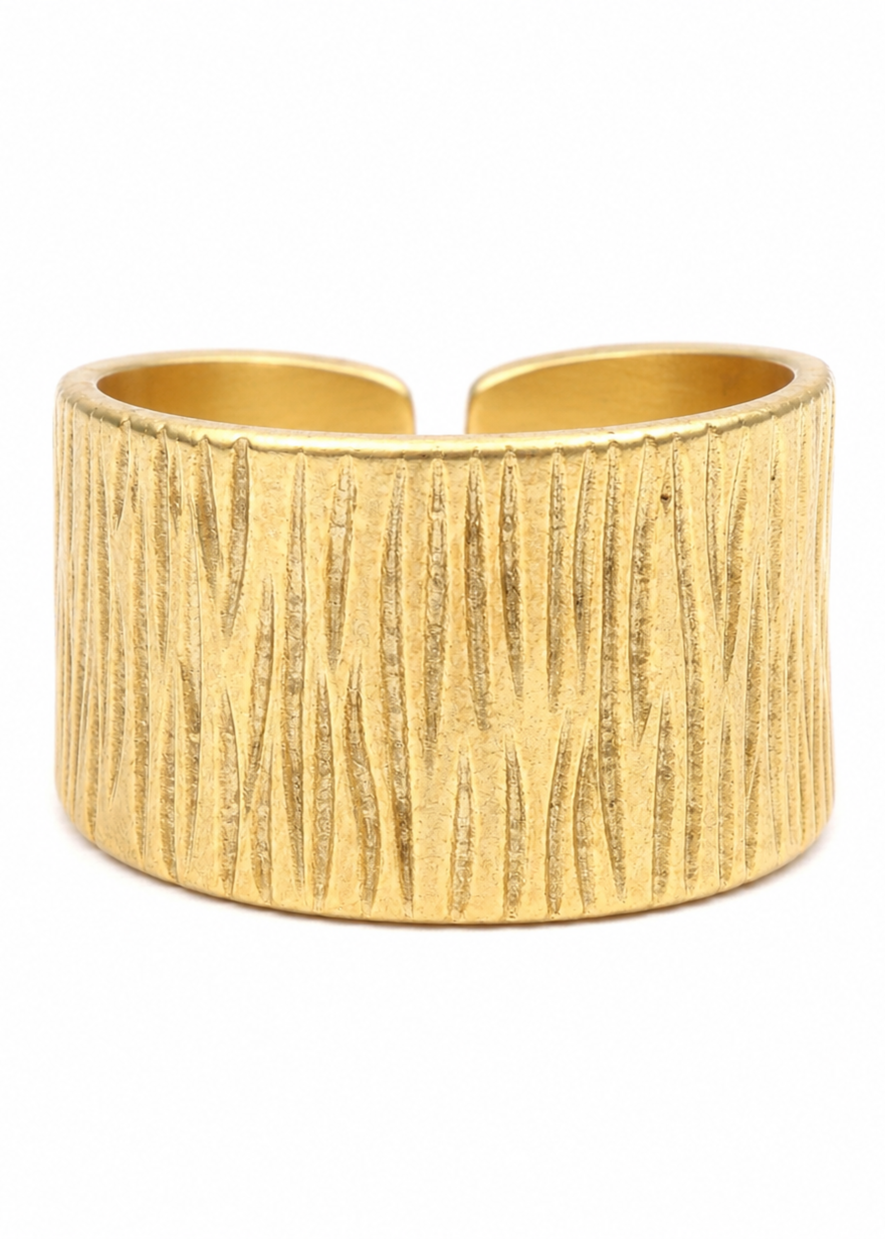 Gold textured cuff bracelet on a white background