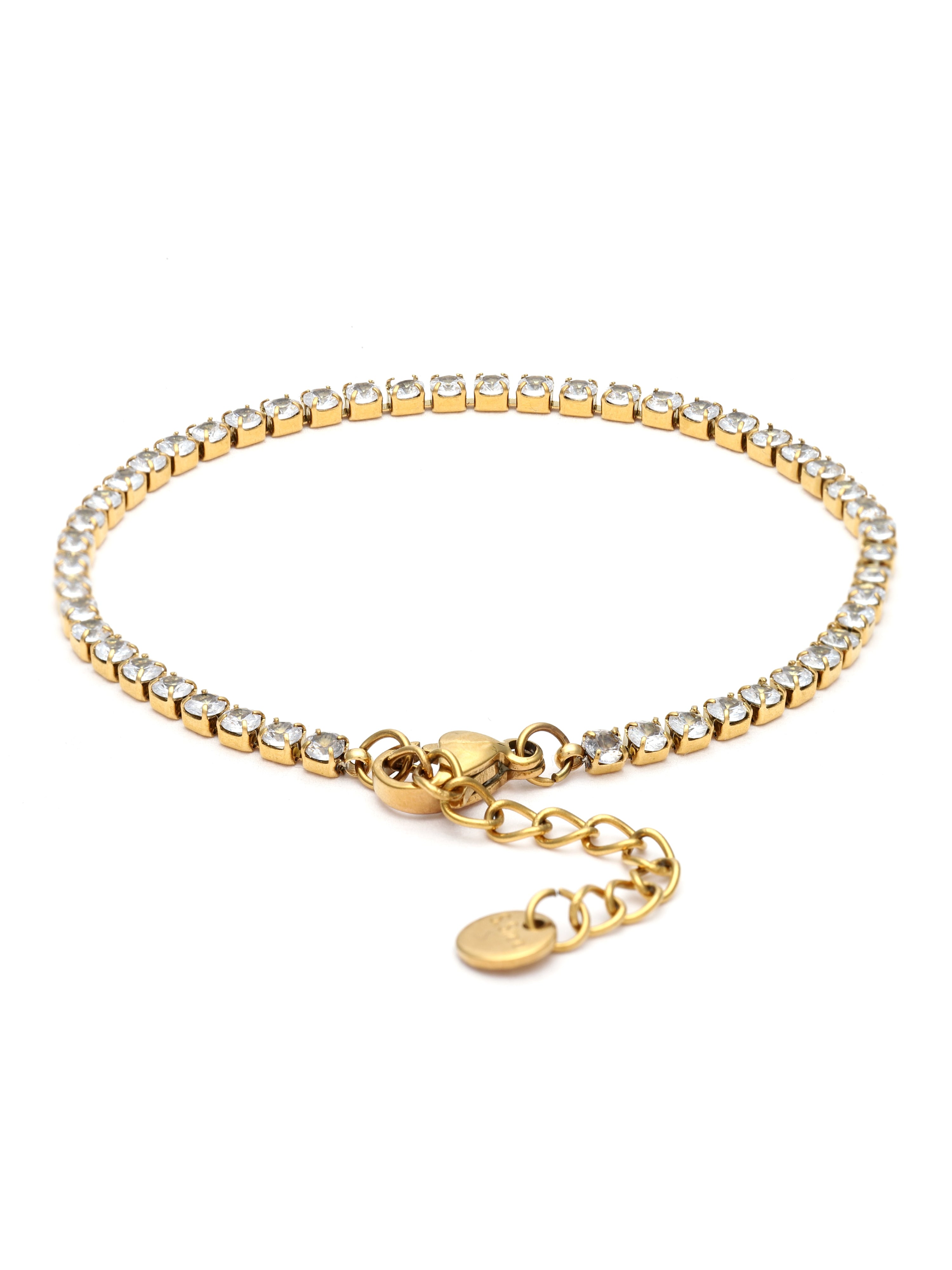 Gold bracelet with clear stones on a white background