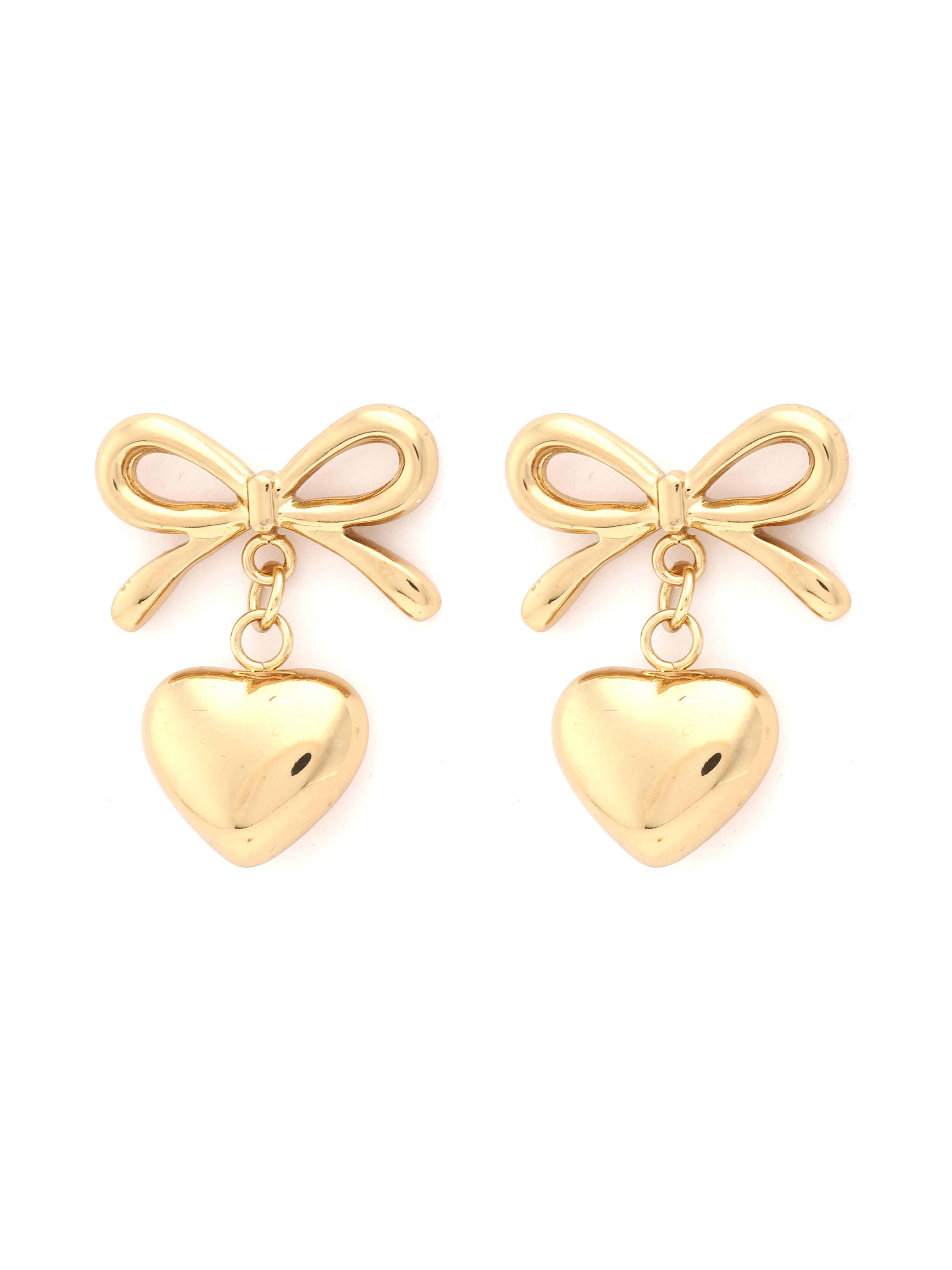 Gold bow and heart earrings on a white background