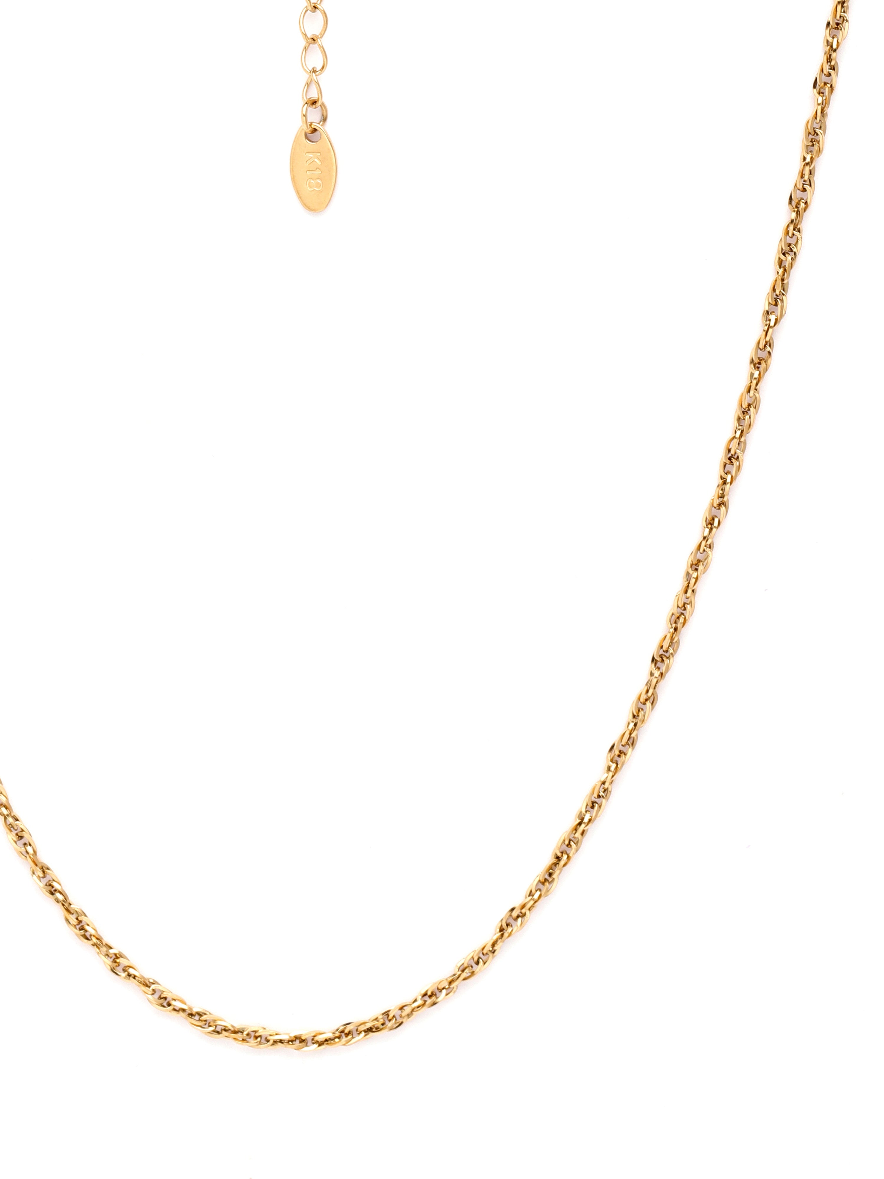 Gold chain necklace on a white background