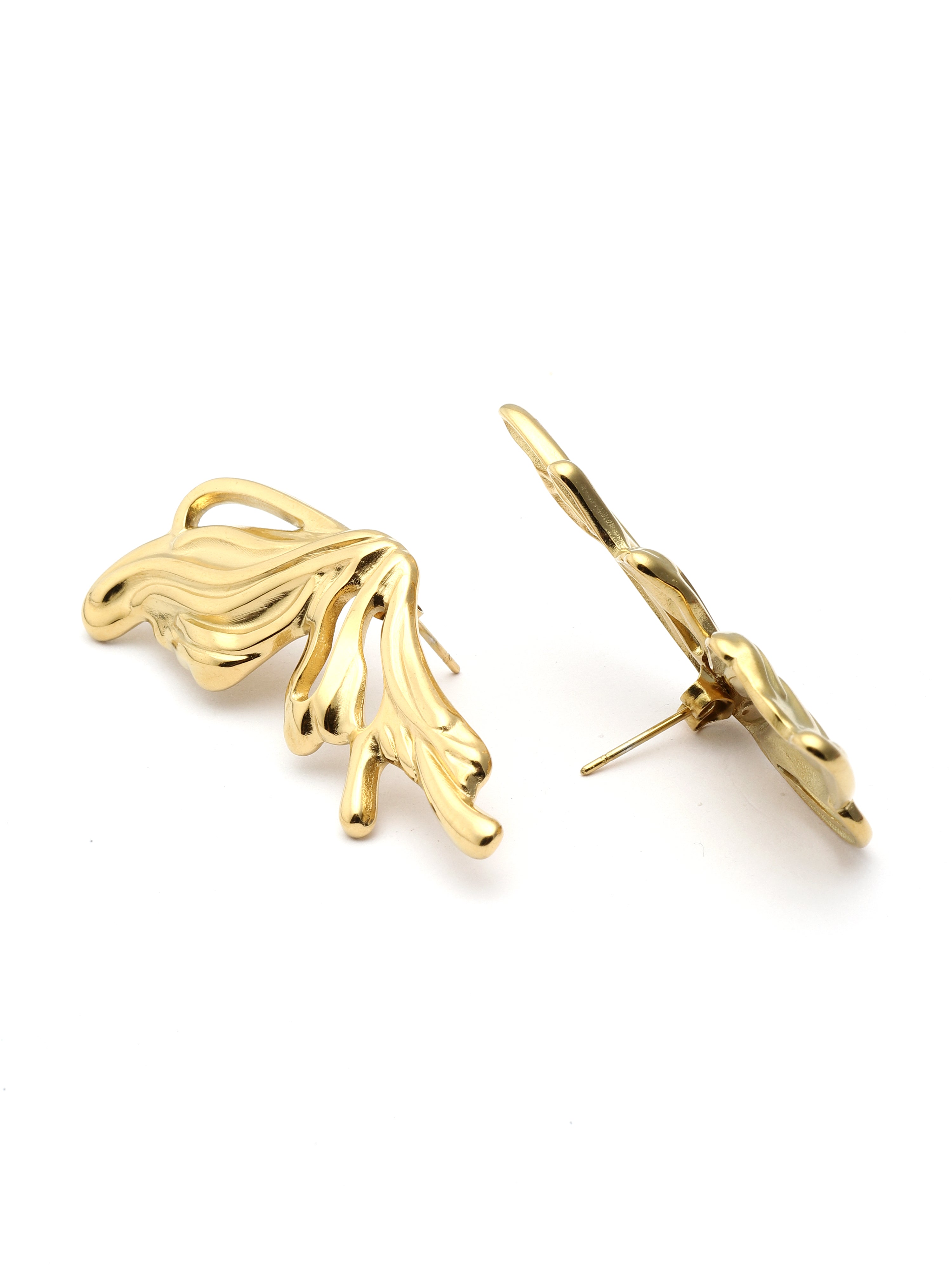 Gold feather-shaped earrings on a white background