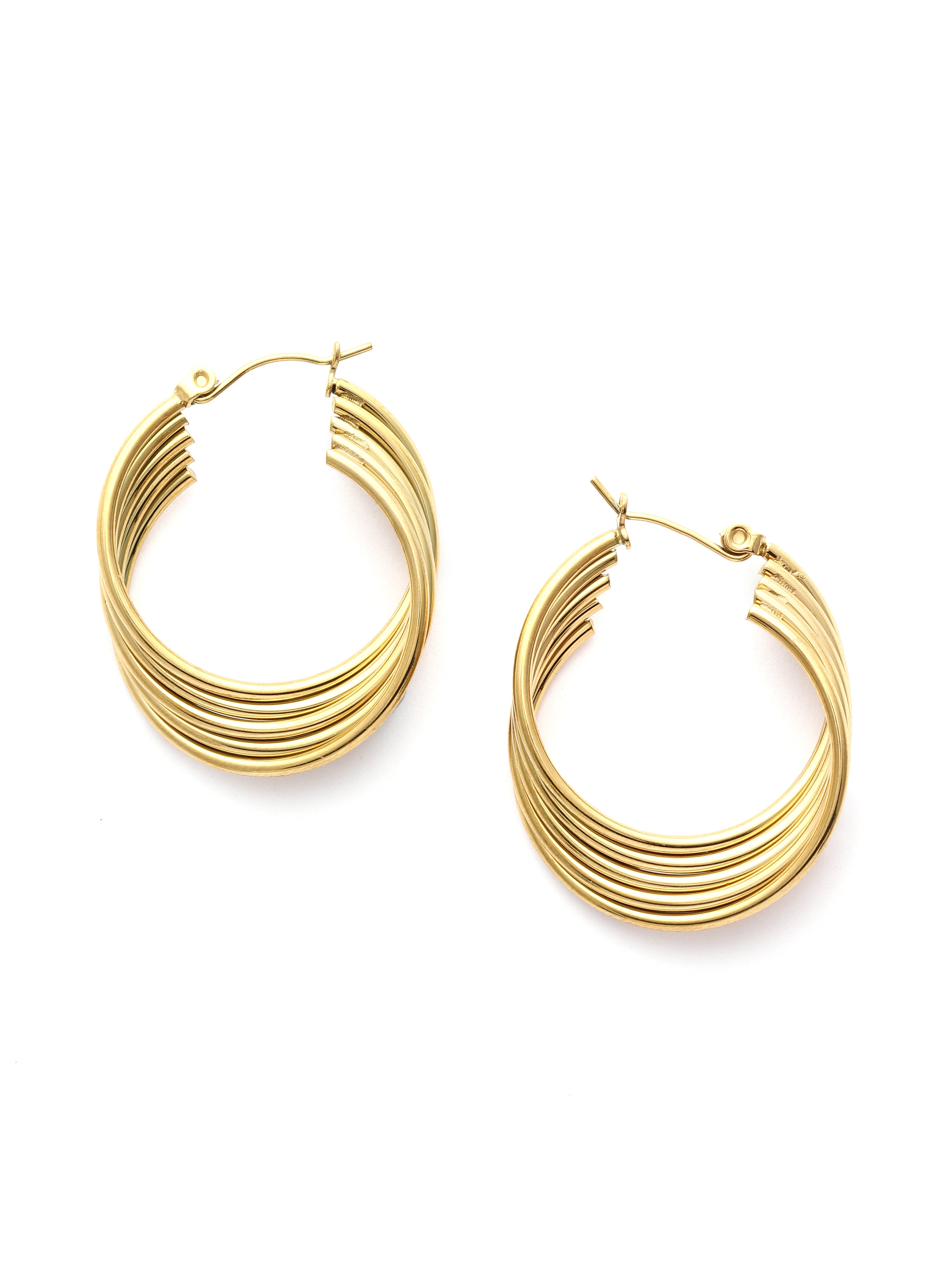 Gold hoop earrings on a white background