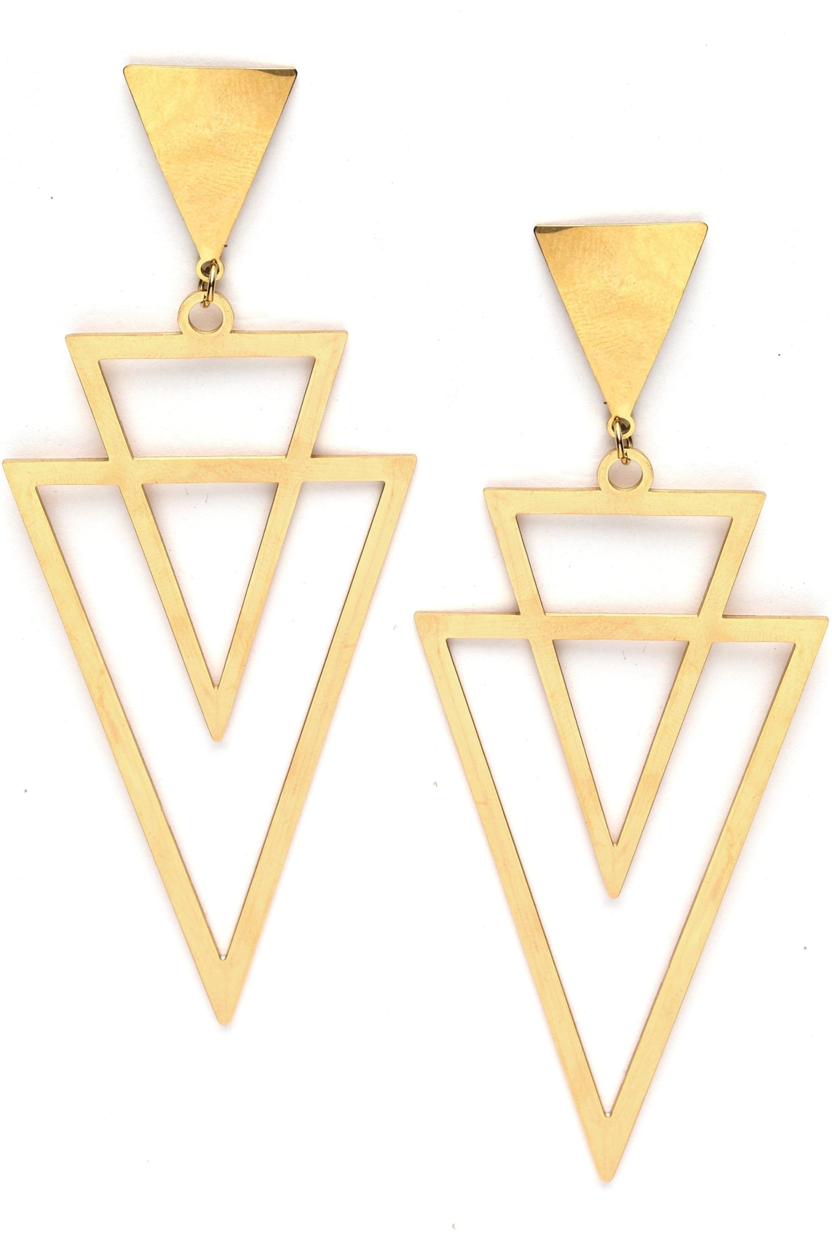 Gold triangle-shaped earrings on a white background