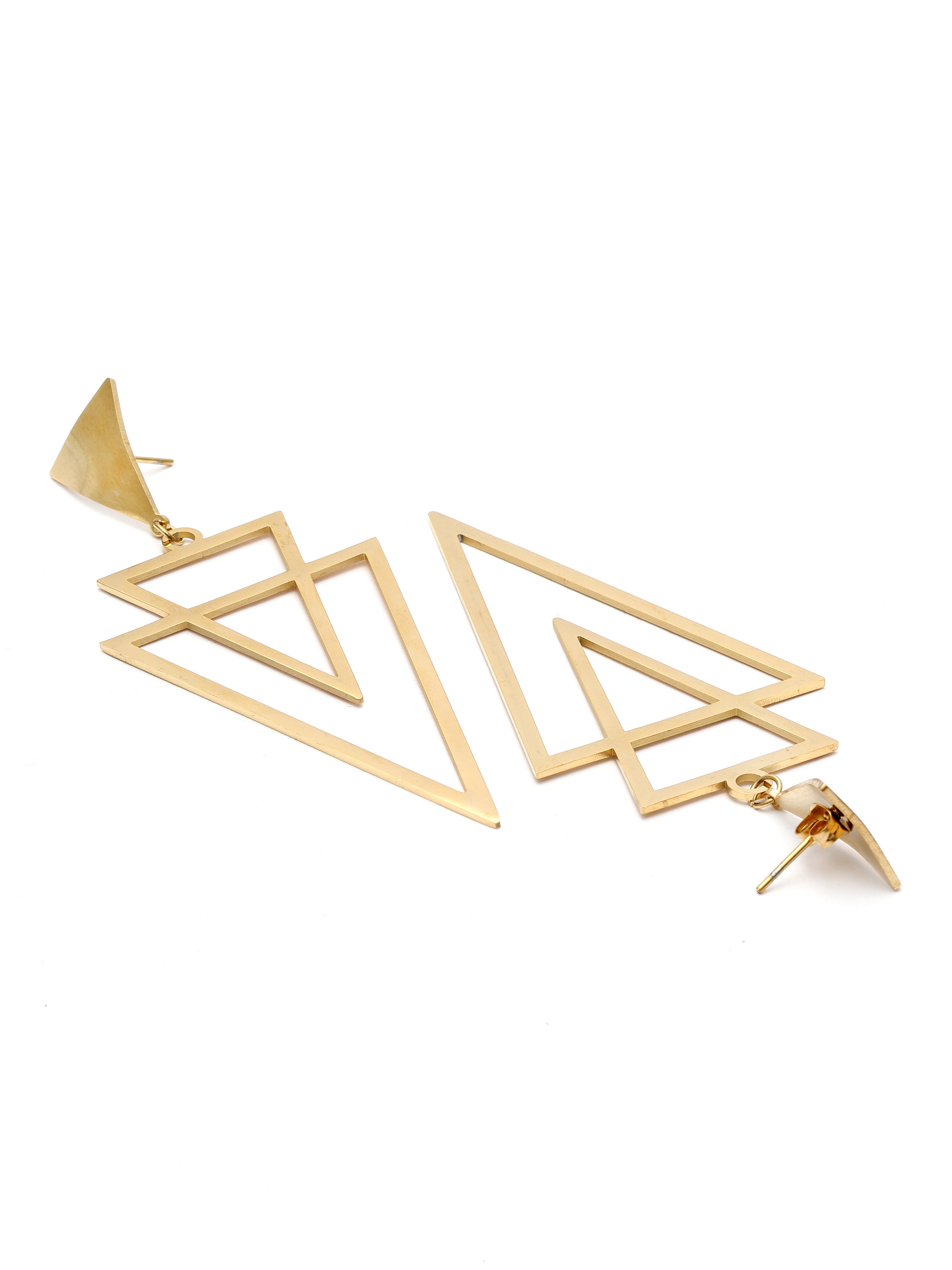 Gold geometric earrings on a white background