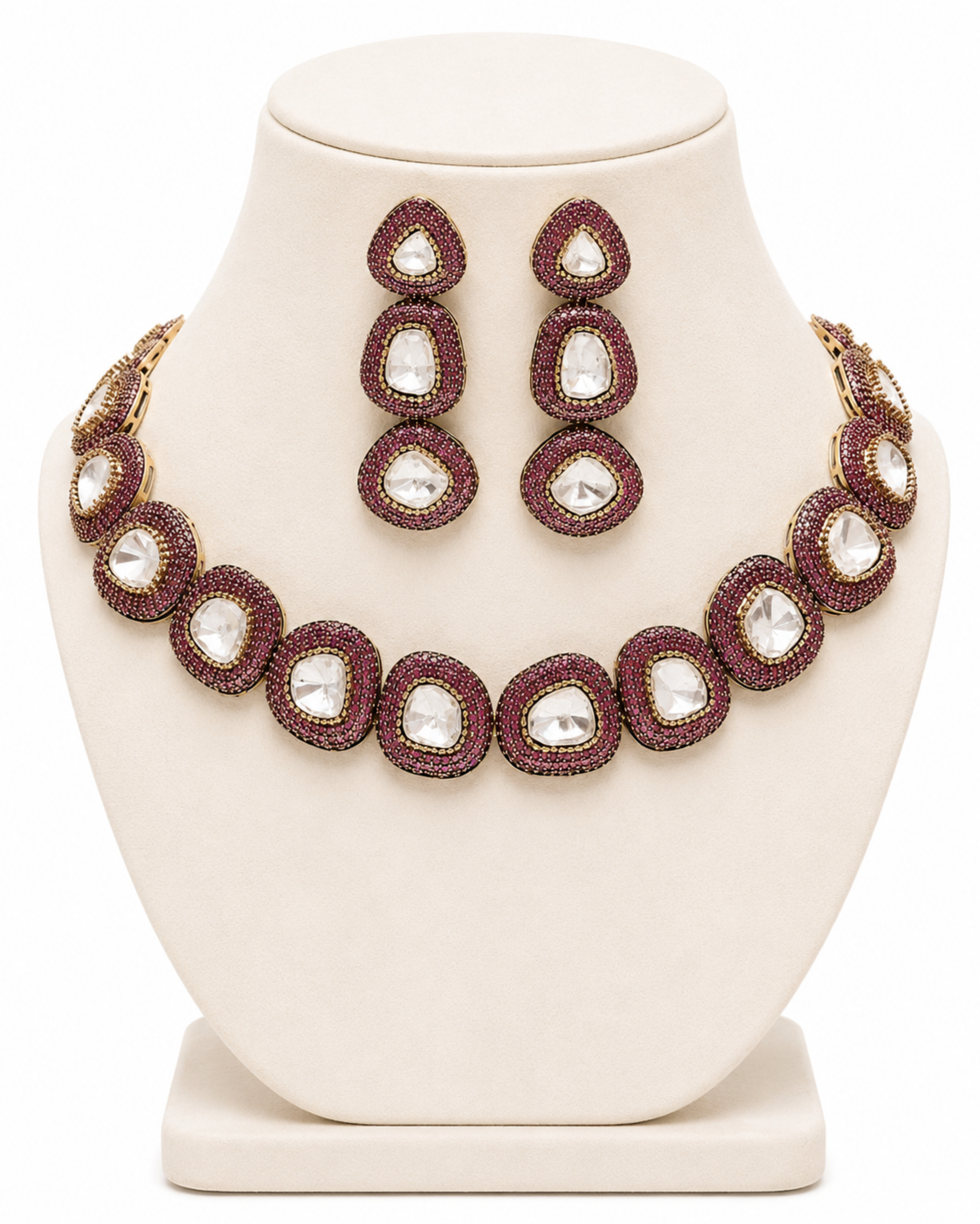 Jewelry set with necklace and earrings on a white stand