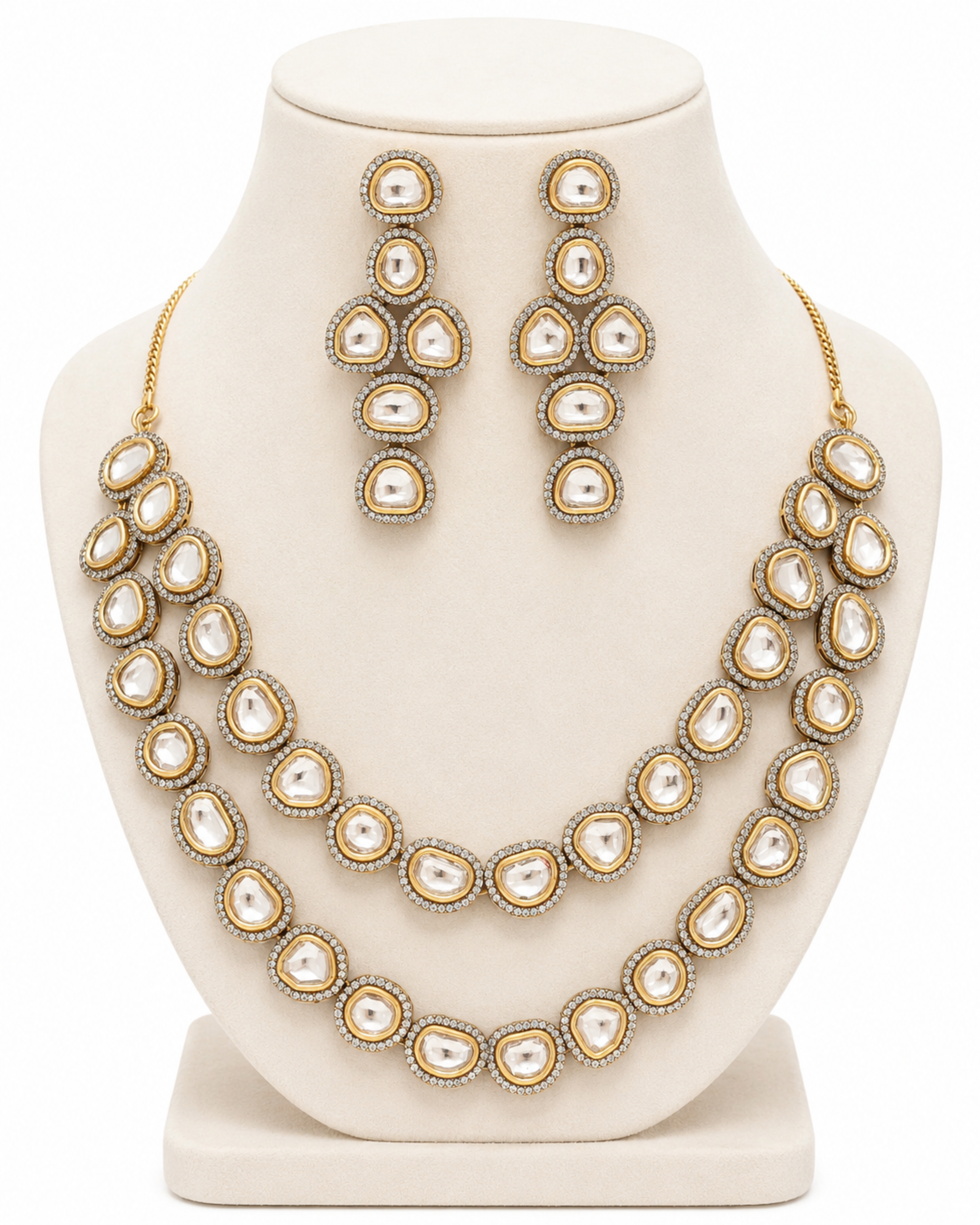 Jewelry set with necklace and earrings on a mannequin bust