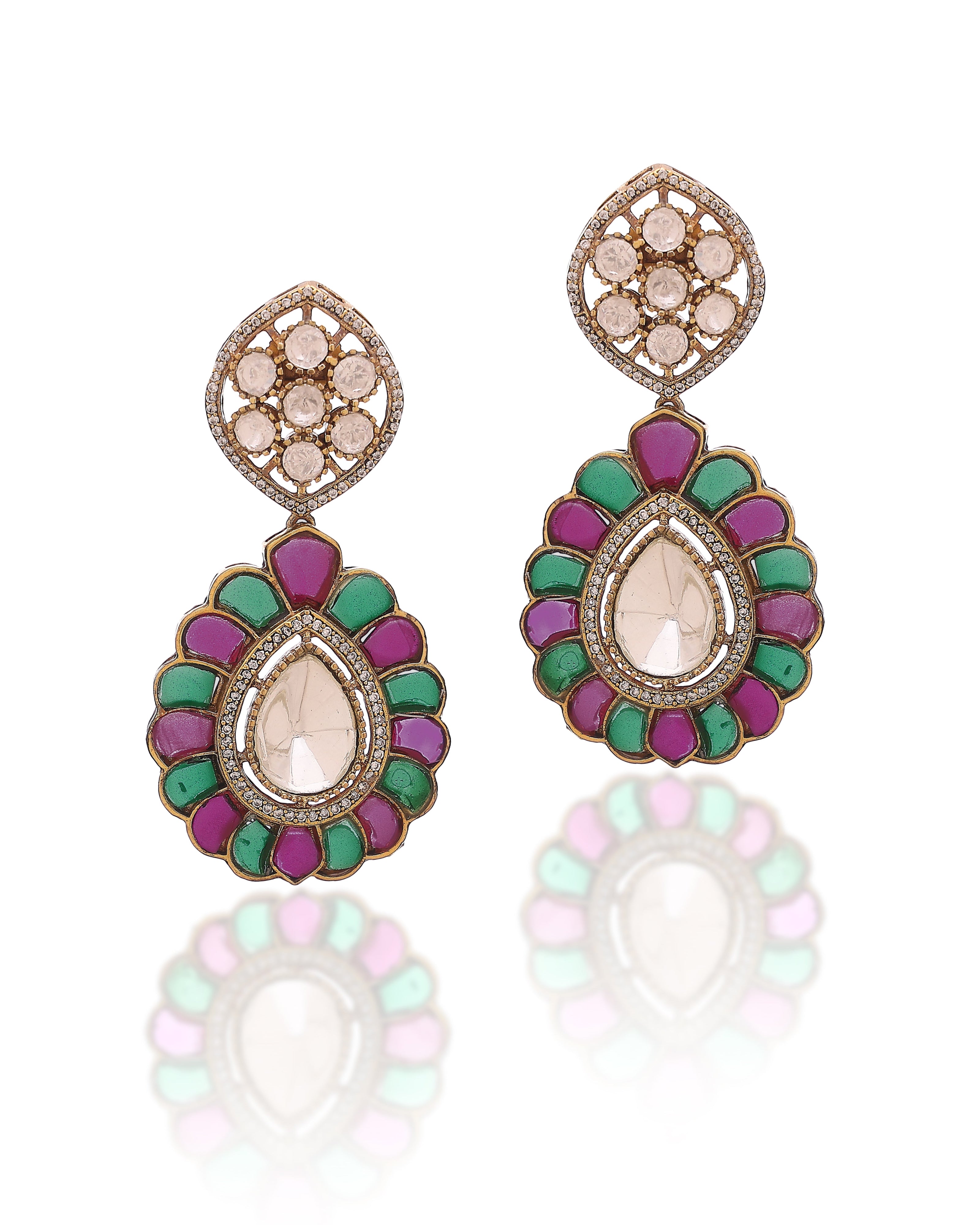 Ornate earrings with colorful gemstones on a white background