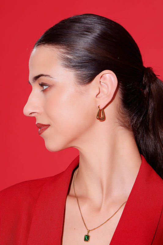 Model wearing Sculpt Hoops – side profile